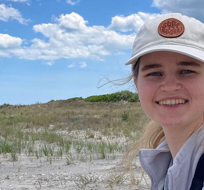 Lily Vanwingerden outdoors in birding gear